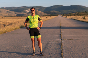 Image showing Triathlete resting after exhausting training for the upcoming marathon.