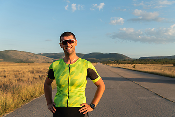 Image showing Triathlete resting after exhausting training for the upcoming marathon.