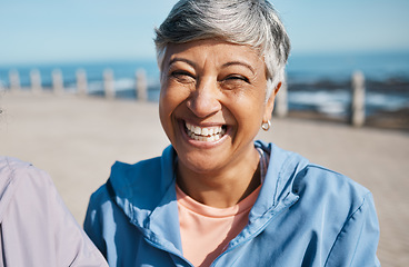 Image showing Senior, fitness and portrait of happy old woman at a beach for walking, running or morning cardio in nature. Smile, face and cheerful elderly female at the sea for workout, freedom and fresh air walk