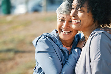 Image showing Senior women, hug and fitness with laughing, friends and joke outdoor happy from workout. Exercise, park and funny female woman with embrace, support and bonding together with health and wellness