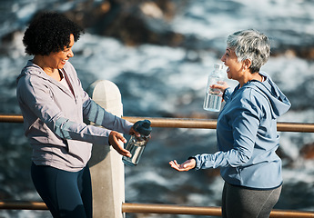 Image showing Fitness, health and happy with senior friends at beach for training, running and relax. Comic, support and workout with old women laughing in nature for funny, happiness and wellness together