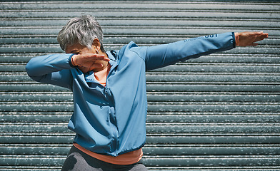 Image showing Woman, exercise and dab dance outdoor at training, fitness or workout achievement with celebration. Mature runner lady, comic dancing and winner in city with mindset, success or commitment to health