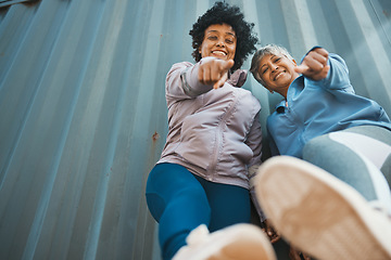 Image showing Below, pointing and portrait of women in the city for cool pov, summer aesthetic or senior fun. Smile, retirement and elderly friends or people with a gesture, urban style or happiness in town