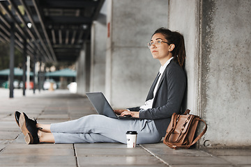 Image showing Thinking, laptop and woman on a coffee break in the city or employee typing on social media, internet or online job search. Unemployed, worker and networking on computer for hiring opportunity