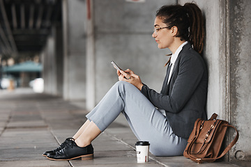 Image showing Woman, reading and phone on coffee break in the city, street or employee relax on social media, internet or online job search. Unemployment, news and worker sitting to check email on cellphone