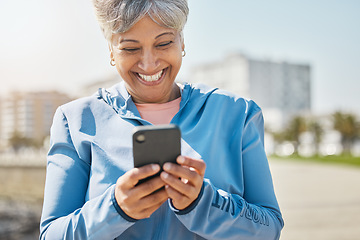 Image showing Fitness, outdoor and senior woman with cellphone, typing and social media with connection, network and happiness. Happy person, pensioner and old lady with a smartphone, smile and contact with health