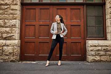 Image showing Fashion, corporate and woman in city for thinking, planning or travel to work. Stylish, confident and young business employee or female worker with style for job at an agency in a town in the morning