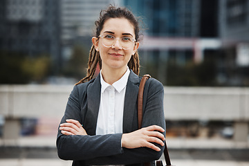 Image showing Business woman, professional portrait and arms crossed outdoor with a career and creative job pride. City, entrepreneur and work commute in morning with female person from New York in urban town