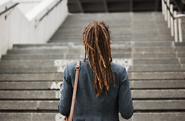 Image showing Business, city and back of woman on stairs with ambition on morning commute, journey and travel. Professional growth, thinking and female person by steps for career progress, work and future in town