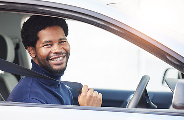 Image showing African driver man, seat belt and smile in portrait for safety, warning or reminder for travel, transport or ride. Young guy, new car and happy with freedom, excited and security to stop crash injury