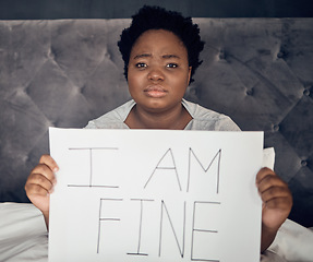 Image showing Portrait, sign and black woman with depression, sad and anxiety in home bedroom. Mental health, face and African person with poster for stress, challenge and life crisis, frustrated and in denial