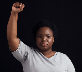 Image showing Portrait, serious and black woman on a studio background for a protest, justice or social freedom. Riot, fight and an African girl ready for government change, conflict or a revolution on a backdrop