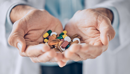 Image showing Person, doctor and hands with pills for medication, drugs or antibiotics for illness, virus or medicine at hospital. Closeup of medical professional palm with tablets or pharmaceuticals at pharmacy