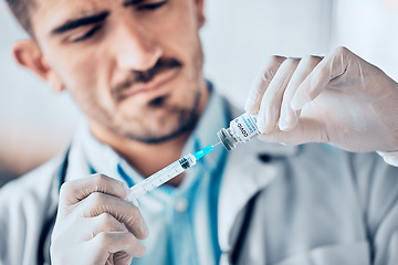 Image showing Man, doctor and syringe with vial for vaccine, healthcare or medication for injection at the hospital. Male person or medical professional holding needle for covid dose, diagnosis or drugs at clinic