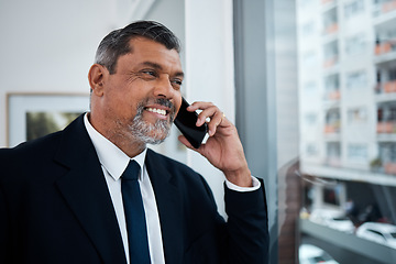 Image showing Happy businessman, phone call and window in office building for communication, networking and discussion. Boss, CEO and executive manager thinking while talking on smartphone conversation in company
