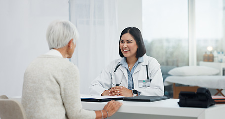 Image showing Healthcare, talking and a doctor with a senior woman, shoulder pain problem and support in an office. Hospital, consulting and a female nurse speaking to an elderly patient about medical advice