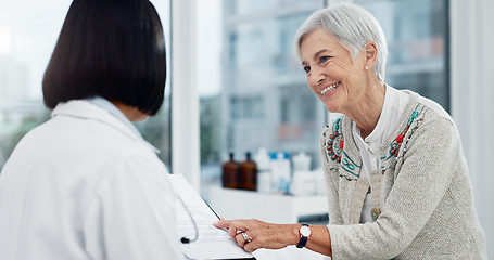 Image showing Senior woman, doctor and happy for results at consultation with paperwork, report or progress for healthcare. Medic, elderly patient and checklist in office for trust, health and advice at hospital