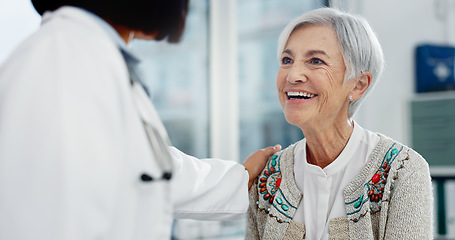 Image showing Senior support, talking and woman with a doctor for healthcare advice, consultation and results. Smile, hospital and an elderly patient with a clinic worker and care for a surgery discussion