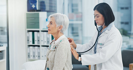 Image showing Elderly woman, doctor and stethoscope on back to listen to lungs for breathing problem. Senior, medical professional and person with cardiology tools for exam, consultation and healthcare in hospital