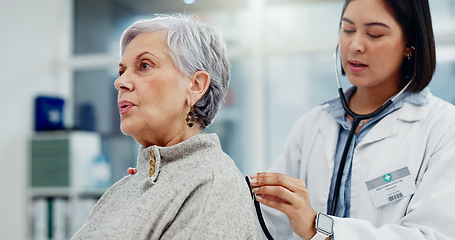 Image showing Senior woman, doctor and stethoscope for breathing on back to listen for lung problem. Elderly, medical professional and person with cardiology tools for exam, consultation or healthcare in hospital