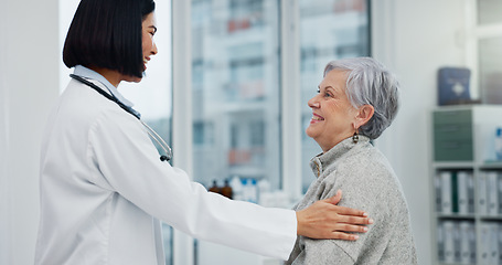 Image showing Senior support, talking and woman with a doctor for healthcare advice, consultation and results. Smile, hospital and an elderly patient with a clinic worker and care for a surgery discussion