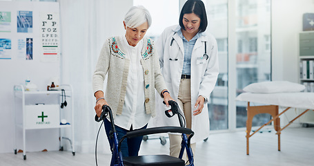 Image showing Old woman, doctor and physiotherapy with walking frame for support, help and healthcare. Senior, medical professional and person with a disability in hospital, rehabilitation and physical therapy.