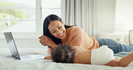 Image showing Remote work, love and mother with baby in a bed for bonding, relax and playing in their home. Work from home, freelance and female relax with newborn, happy and smile while having fun in a bedroom