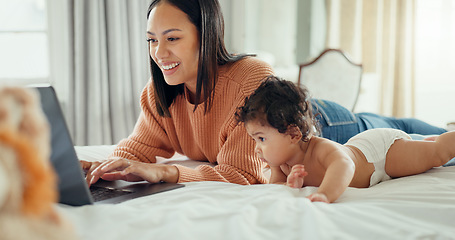 Image showing Laptop, love and mother with baby in a bed for bonding, relax and playing in their home. Family, social media and female mom influencer with newborn in a bedroom and content creation for online blog