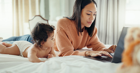 Image showing Love, laptop and mother with baby in a bed for bonding, relax and playing in their home. Family, social media and female mom influencer with newborn in a bedroom and content creation for online blog