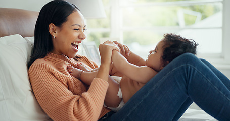 Image showing Relax, smile and mother with baby on bed for playful, love and free time. Happiness, care and health with woman and newborn infant in bedroom for family home for support, excited and youth
