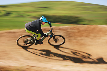 Image showing Bicycle, man and cycling in motion blur on dirt path for competition, fast power and off road adventure. Athlete, sports and mountain bike for action, cardio race and speed in performance contest