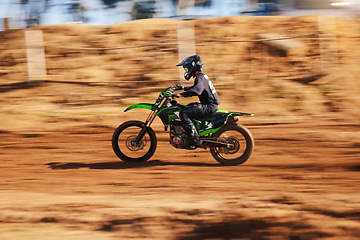 Image showing Motorcycle, sports and man in the countryside for fitness, adrenaline and speed training outdoor. Dirt road, bike and male driver on motorbike with freedom, performance and moto stunt hobby in nature