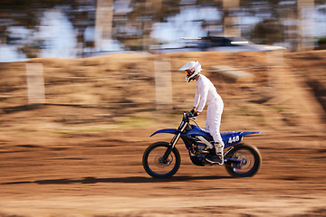 Image showing Sports, motorbike and man in the countryside for fitness, adrenaline and speed training outdoor. Dirt road, bike and male driver on motorcycle with freedom, performance and moto hobby stunt in nature