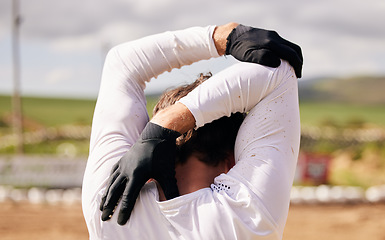 Image showing Stretching arms, person and cycling in nature for fitness, training and travel in the countryside. Back, workout and an athlete with a warm up for bike sports, exercise or getting ready to start