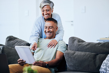 Image showing Senior couple, tablet and point on sofa with smile, comic laugh or watch funny video on internet in home. Mature man, elderly woman and digital touchscreen with choice, shopping or social network app