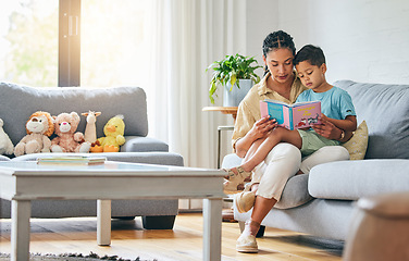 Image showing Learning, book and mother with boy on a sofa for education, growth and child development in their home. Reading, love and mom with kid in living room for storytelling, literacy and communication