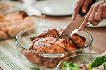 Image showing Hands, cutting turkey and thanksgiving in closeup, lunch or food for event, celebration and nutrition. Person, cutlery and chicken food for eating, share and culture for diet, zoom or dinner in home