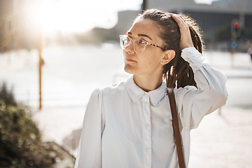 Image showing City, thinking and business woman on a sidewalk with travel, commute and urban journey. Road, outdoor and female professional in the morning traveling for work, career and job in New York on street