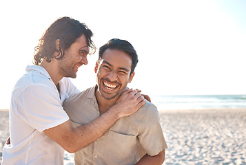 Image showing Love, smile and gay men on beach, hug and laugh on summer vacation together in Thailand. Sunshine, ocean and mockup, happy lgbt couple embrace in nature for on fun holiday with pride, sea and sand.