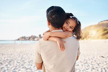 Image showing Portrait of child, hug or father by ocean in Rio de Janeiro, Brazil with support, care or love in summer. Back, parent or dad with kid at sea to enjoy family bonding together in nature by beach sand