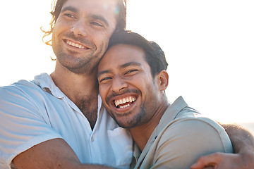 Image showing Love, hug and gay couple, men with sky and smile on summer vacation together in Thailand. Sunset, ocean and romance, happy lgbt people embrace in nature on fun holiday with pride, laughing and fun.