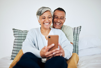 Image showing Mature, couple and selfie in bed at home with smile, retirement love and happy marriage. House, mobile and social media for profile picture in bedroom relax and online together and photo on web