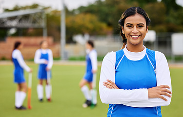 Image showing Field hockey woman, portrait and smile for sports, leadership and team at training for competition. Girl, athlete and outdoor with pride for fitness, workout or exercise with happy for development