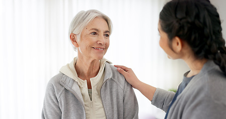 Image showing Consultation, physical therapy and senior woman with a nurse in a medical clinic or rehabilitation center. Healthcare, wellness and elderly female patient talking to a physiotherapist at a checkup.