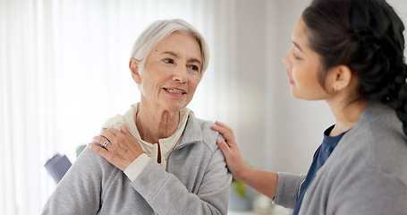 Image showing Consultation, physical therapy and senior woman with a nurse in a medical clinic or rehabilitation center. Healthcare, wellness and elderly female patient talking to a physiotherapist at a checkup.