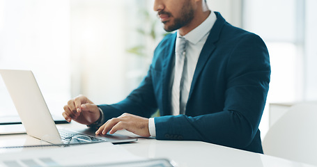 Image showing Business man, suit and typing on laptop for network update, corporate insight and review in law firm. Closeup of lawyer, attorney and working on computer for legal research, planning admin and email