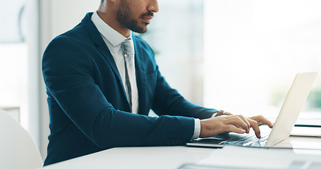 Image showing Business man, suit and typing on laptop for network update, corporate insight and review in law firm. Closeup of lawyer, attorney and working on computer for legal research, planning admin and email