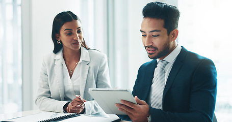 Image showing Tablet, meeting and partnership with business people working in an office as a team for research. Technology, planning or teamwork with a man and woman employee reading information in the workplace