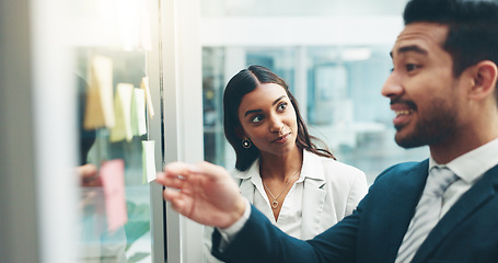 Image showing Business people, teamwork and brainstorming on glass in office for agenda, collaboration and planning ideas. Man, woman and employees at board for feedback of schedule, mindmap and timeline of goals