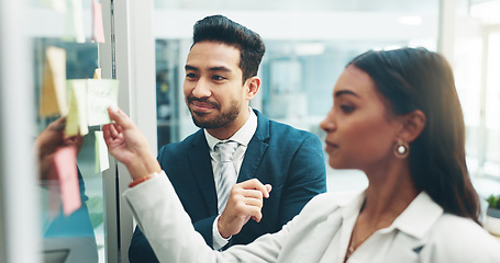 Image showing Business people, teamwork and brainstorming on glass in office for agenda, collaboration and planning ideas. Man, woman and employees at board for feedback of schedule, mindmap and timeline of goals